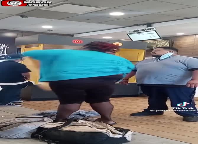 Video :After being booted from a McDonald's, a homeless woman who is dragging her blanket loses it